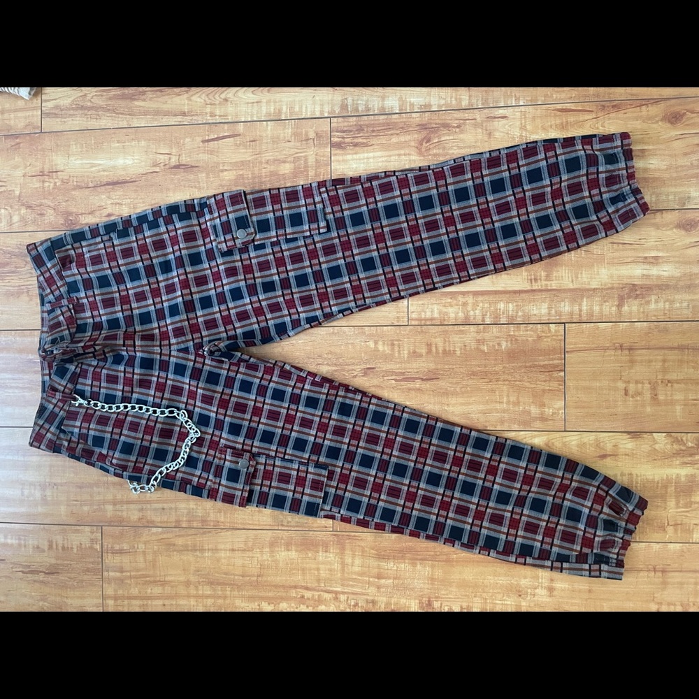 Form fitting plaid joggers w/chain . Never worn